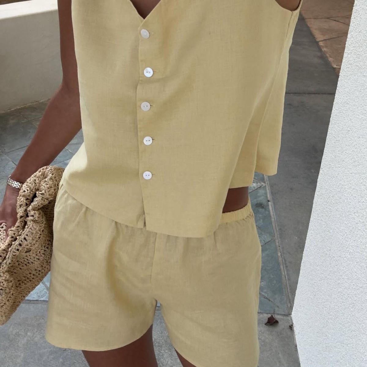 Lison Sebellin wearing a yellow linen coord
