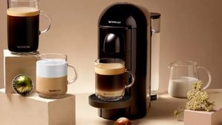 The Nespresso Vertuo Plus surrounded by coffee and Vertuo capsules