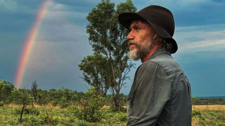 Steve Boyes looks at a rainbow in National Geographic's Ghost Elephants