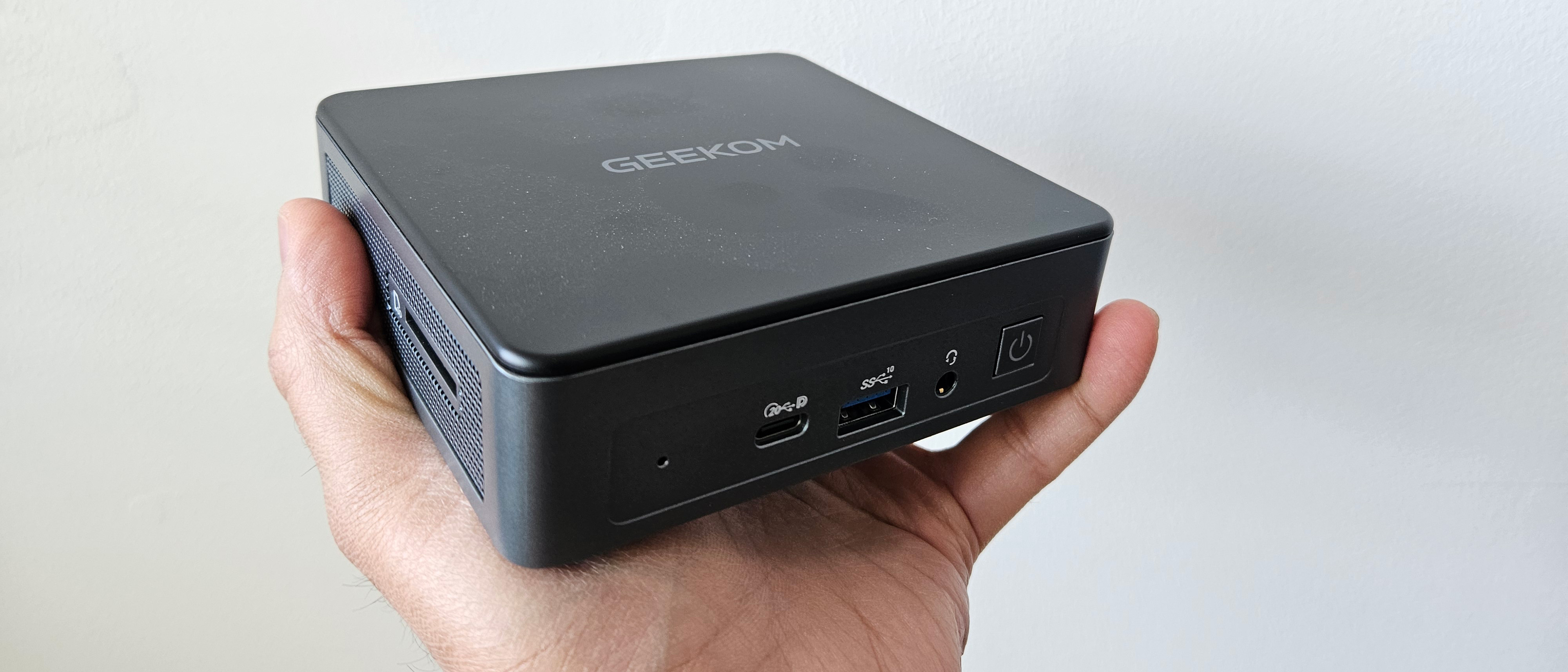 Our reviewer holding up the Geekom Air12 2026 Edition
