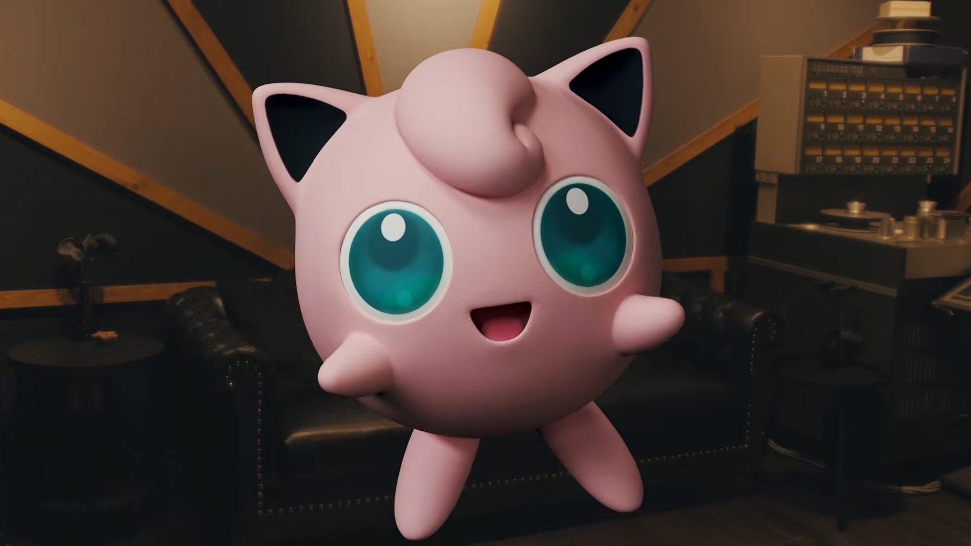 3D Jigglypuff smiling at the camera from a real recording studio