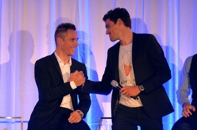 BMC teammates Philippe Gilbert and Greg Van Avermaet at the 2014 awards ceremony
