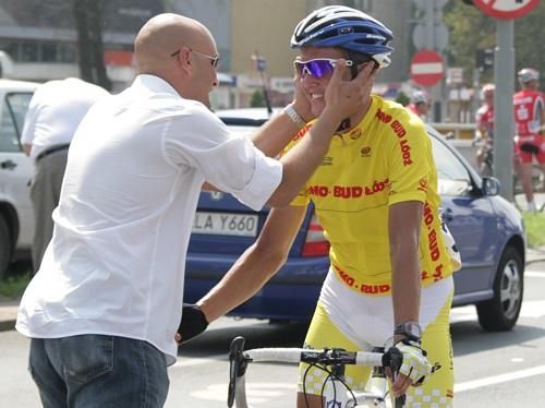 Artur Kr&oacute;l is congratulated after the finish.