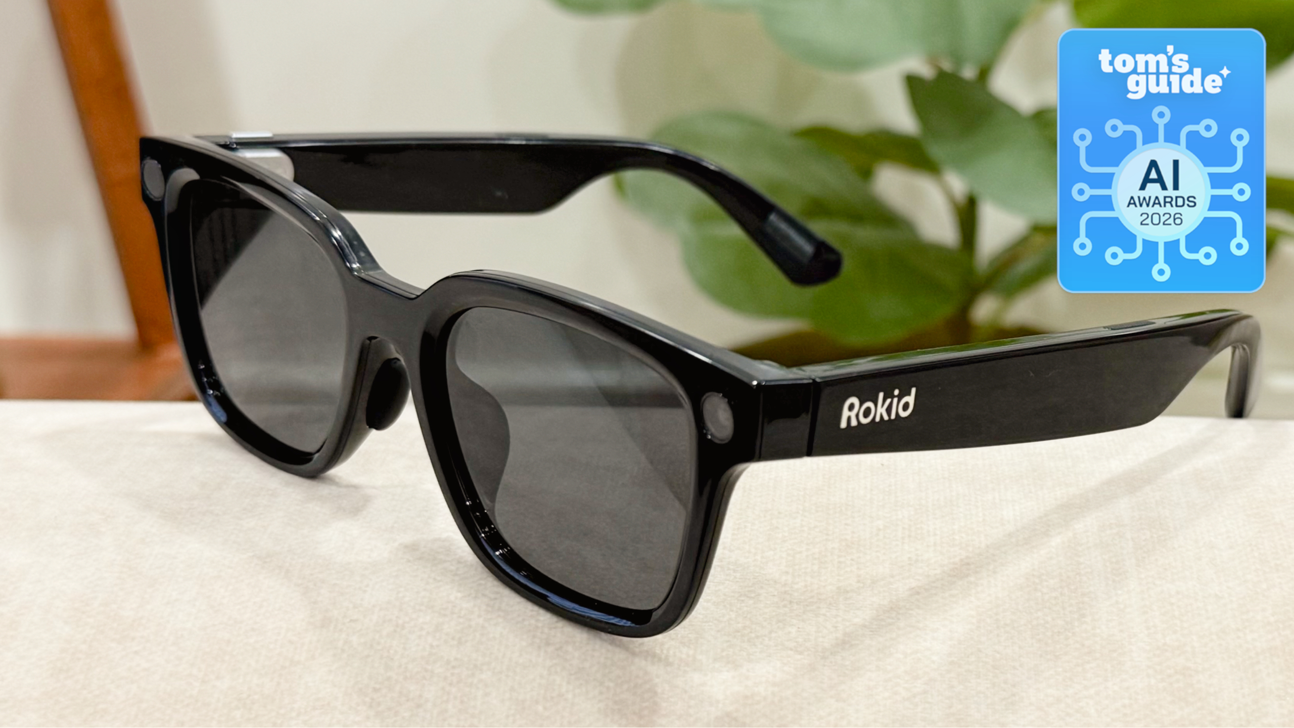 The Rokid AI Glasses Style on a table with a Tom's Guide AI Awards 2026 badge