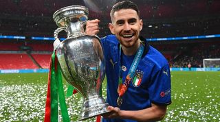 Jorginho celebrates with the Euro 2020 trophy after Italy's win over England in the final at Wembley.