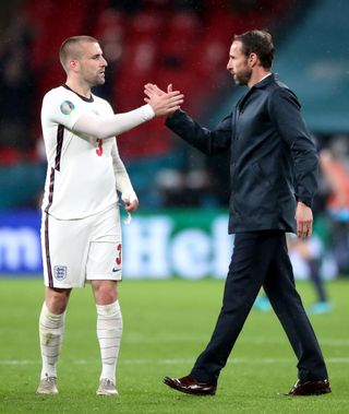 England’s Luke Shaw (left) and England manager Gareth Southgate
