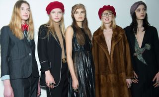 Female models wearing black and brown clothes from the A/W 2015 collection