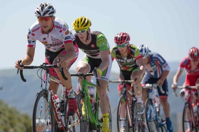 Sean Mazich leads the field over the ninth lap in pursuit of the breakaway.