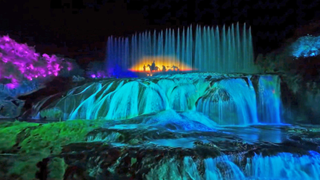 Christie Griffyn 4K50-RGB projectors create breathtaking visuals on Doupotang Waterfall, captivating audiences with vibrant displays.