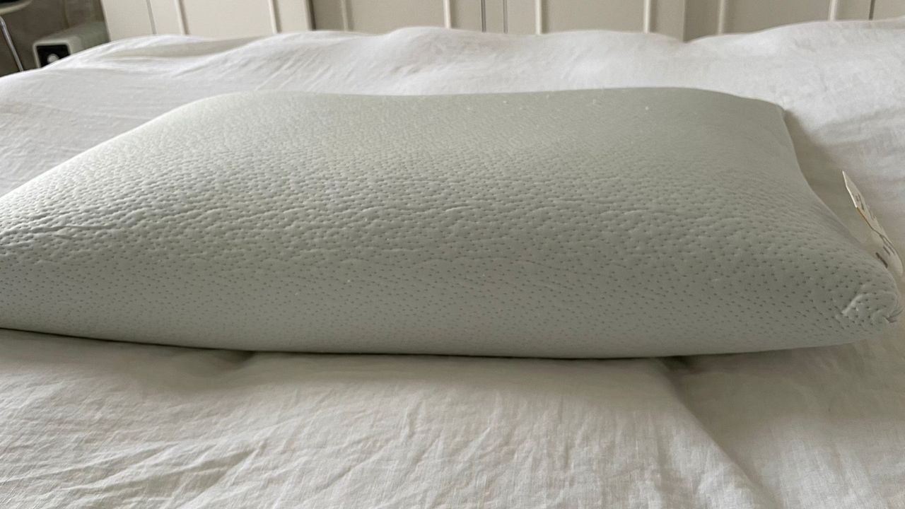 TheraPur&reg; Memory Foam Ice Pillow on the bed (2)