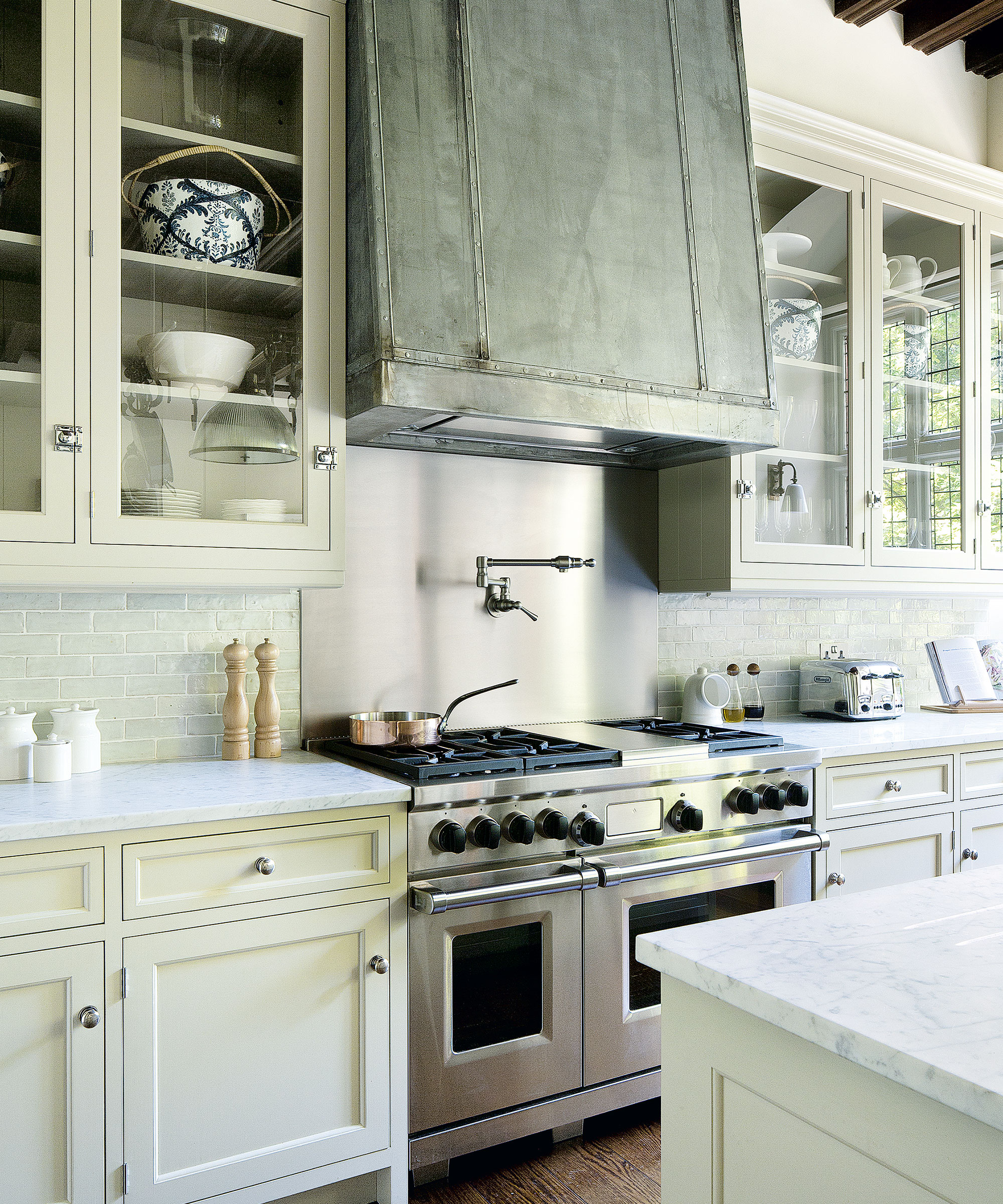 Kitchen trends with metal extractor hood