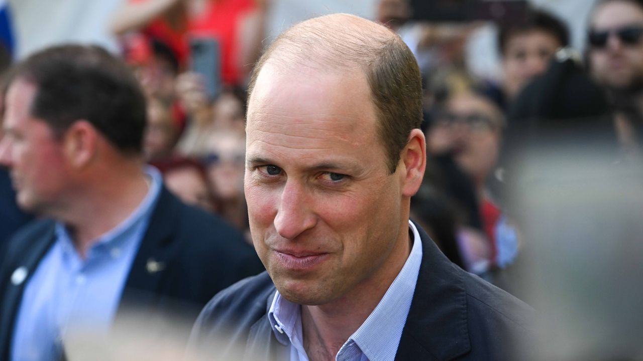 Prince William &quot;pleased&quot; about this coronation change. Seen here he speaks to people during a walkabout at The Big Lunch in Windsor