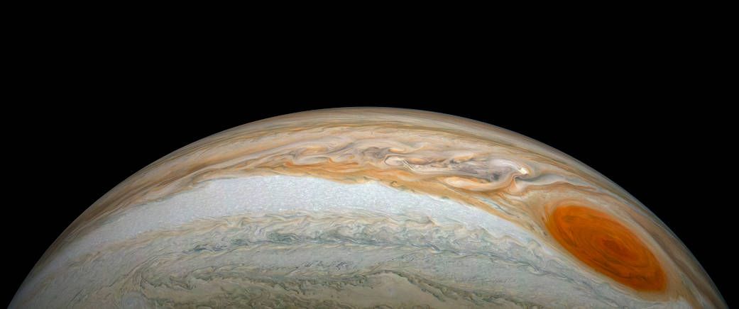 This image showcases the contrast between the colorful South Equatorial Belt and the white Southern Tropical Zone on Jupiter. In this white region you can also easily spot the Great Red Spot. This image was created by citizen scientist Kevin M. Gill from a raw image taken on July 20, 2019.