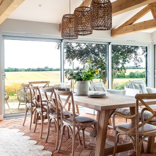 farmhouse with modern extension decorated in shades of grey and white