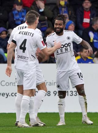 Tyrone Marsh (right) scored a fine goal as Boreham Wood beat AFC Wimbledon in the FA Cup third round.