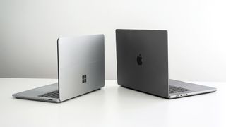 Apple M1 Max Macbook Pro and Microsoft Surface Laptop side by side