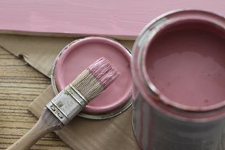 a tin of pink paint