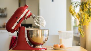 Top 10 Prime Day Kitchen Deals: image of red stand mixer, eggs and flour