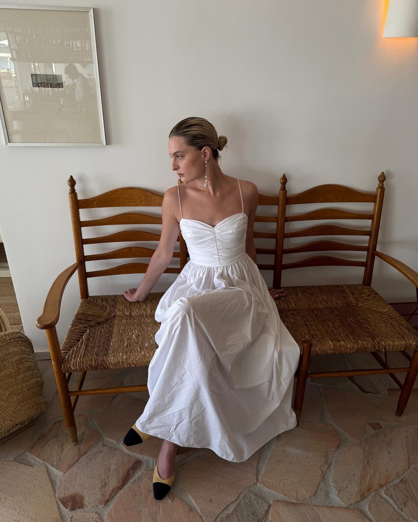 woman in white maxi dress