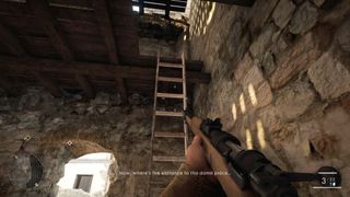 Climb the ladder to the second floor of the tower.