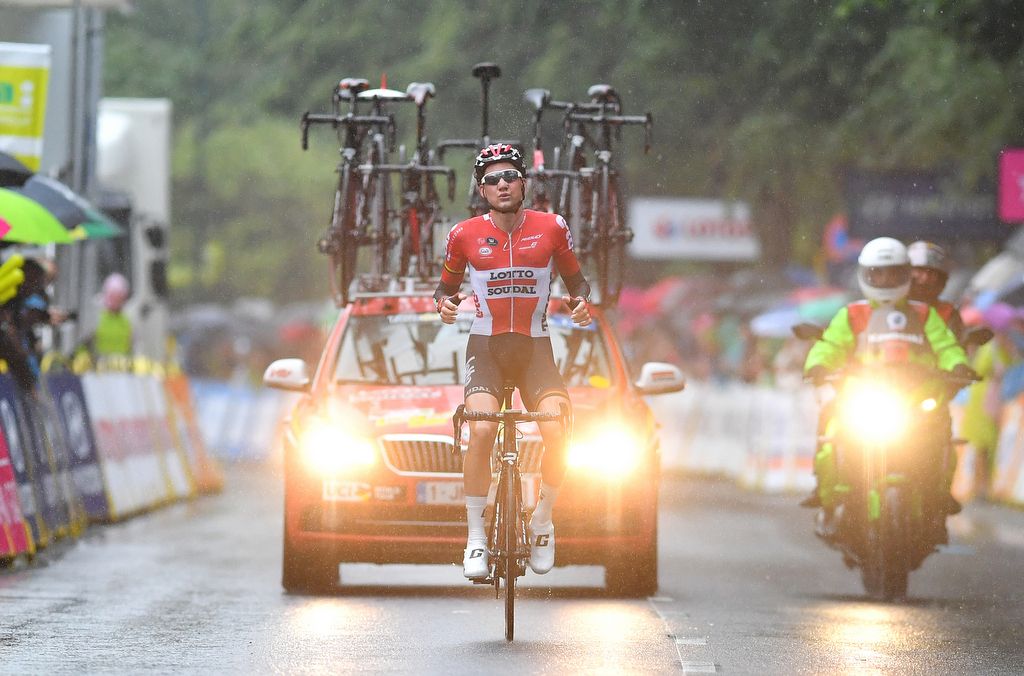 Tim Wellens (Lotto Soudal) wins a soaked stage
