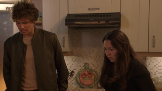 Freddie Slater and Stacey Slater horrified as they look at Theo Hawthorne's lifeless body on the floor.