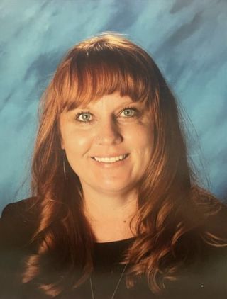 A headshot of educator Heidi Carr