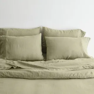 A sage-shaded bedding set in linen.