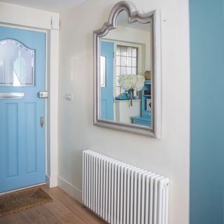 blue hallway makeover with cornflower blue dresser