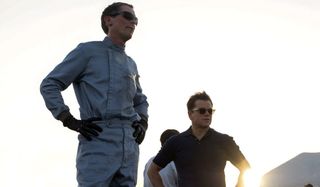 Ford v Ferrari Christian Bale and Matt Damon standing in the sunlight