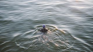 A wild swimmer in open water