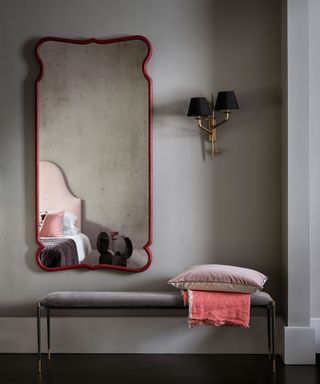 dressing room statement red mirror with upholstered bench