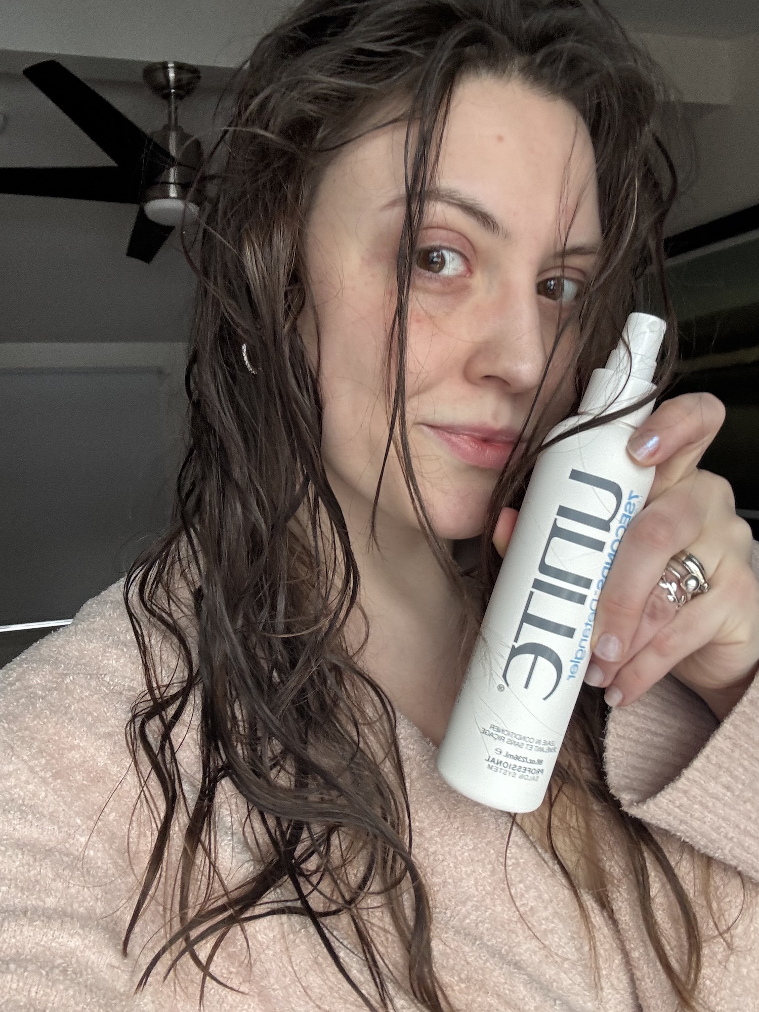 Sophia Vilensky before combing her hair with Unite 7 Seconds Detangler.