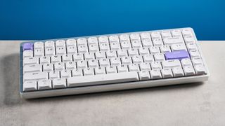 A white and purple Epomaker Luma84 low-profile mechanical keyboard
