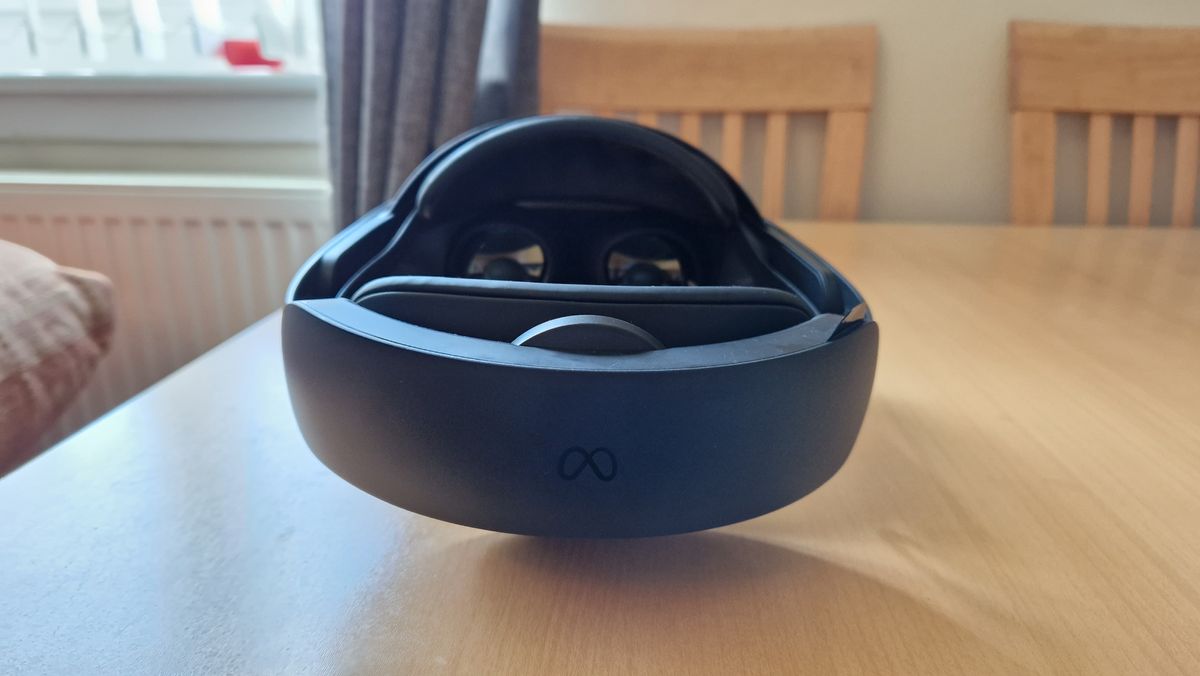 Image of the Meta Quest Pro headset being worn, with a futuristic aesthetic