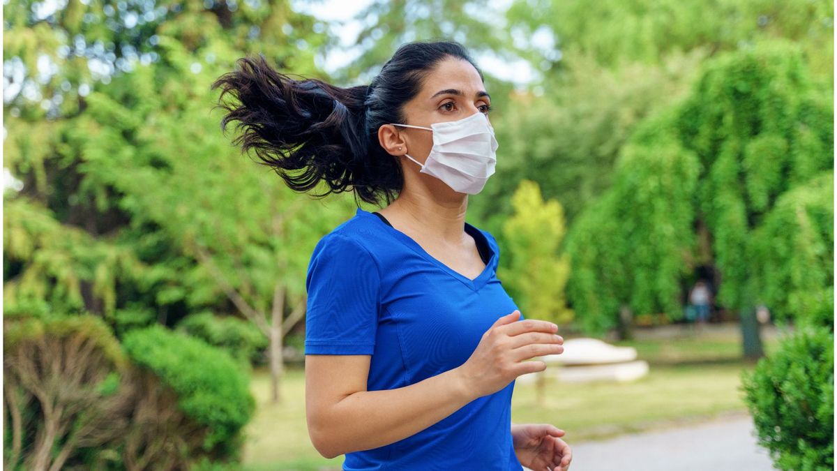 Woman running with mask