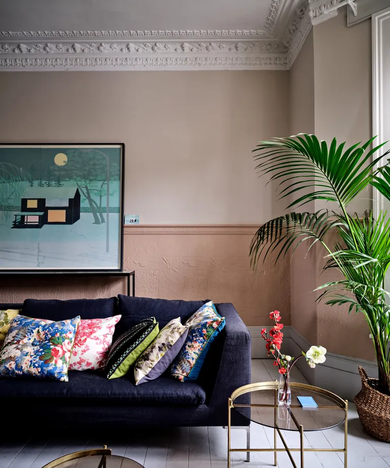 A living room painted half-and-half withStirabout No.300 and Templeton Pink No.303