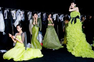 Fashion models in green outfits