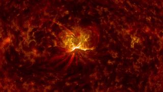 The sun fires off a powerful X1.6-class solar flare on Sept. 10, 2014 in this image captured by NASA's Solar Dynamics Observatory. The flare was associated with an Earth-directed solar eruption, called a coronal mass ejection, that could amplify northern lights displays.