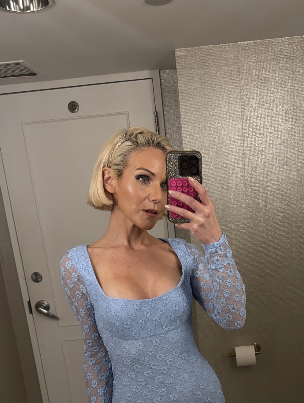 Micaela English in a blue dress