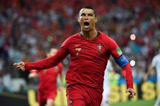 Cristiano Ronaldo celebrates after scoring for Portugal against Spain at the 2018 World Cup.