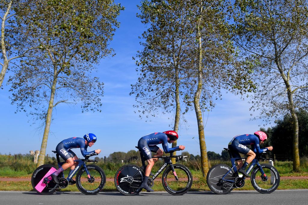 BRUGES BELGIUM SEPTEMBER 22 LR Lawson Craddock of United States Brandon Mcnulty of United States and Neilson Powless of United States sprint during the 94th UCI Road World Championships 2021 Team Time Trial Mixed Relay a 445km race from KnokkeHeist to Bruges flanders2021 TT on September 22 2021 in Bruges Belgium Photo by Luc ClaessenGetty Images