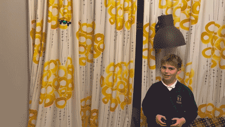 Adam Juniper's son flying a drone indoors