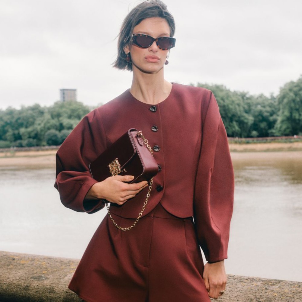 woman in matching red outfit
