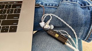 EarFun EH100 with DAC plugged into a MacBook