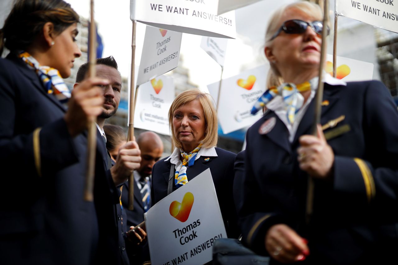 Ex-Thomas Cook employees demonstrate in London on October 2, 2019, after delivering a petition calling for a full inquiry into Thomas Cook&amp;#039;s collapse and for the company&amp;#039;s directors to pay ba