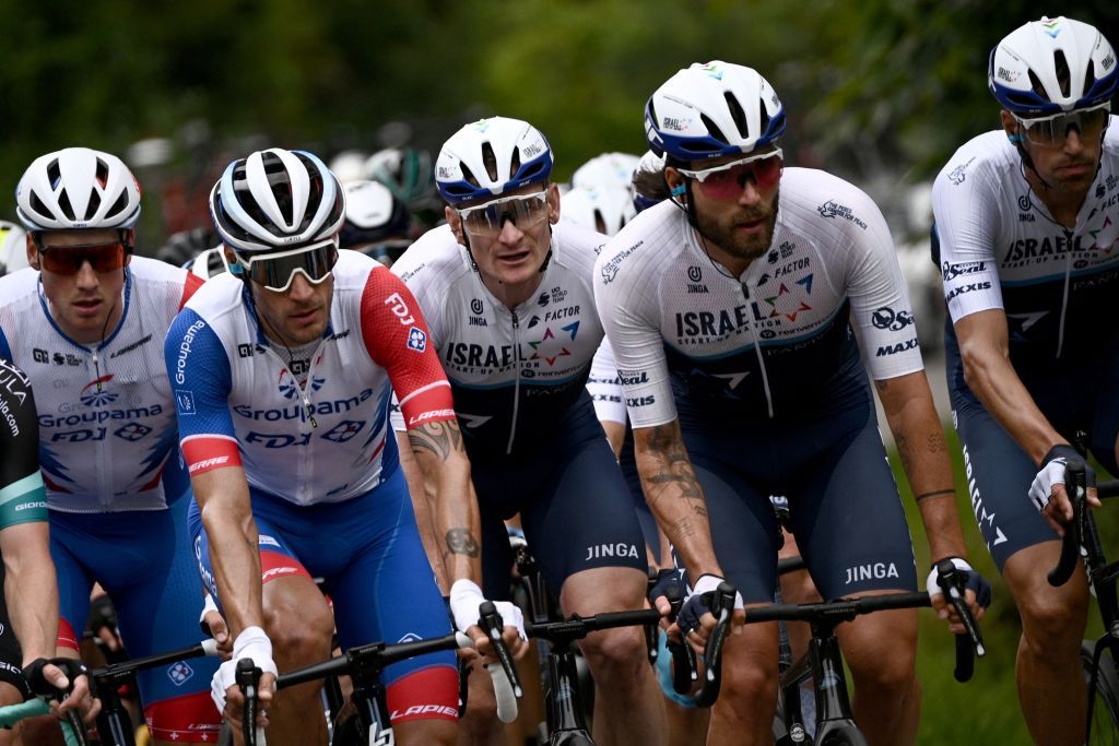 The pack rides during the 1st stage of the 108th edition of the Tour de France cycling race 197 km between Brest and Landerneau on June 26 2021 Photo by AnneChristine POUJOULAT AFP Photo by ANNECHRISTINE POUJOULATAFP via Getty Images