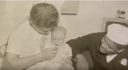 Norm Van Sloun with baby George.
