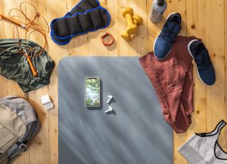 a photo of a flat lay of gym kit including some ankle weights