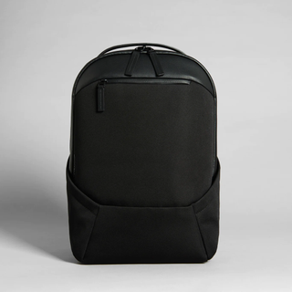 tried and tested gifts: black sleek backpack with leather panel on the top